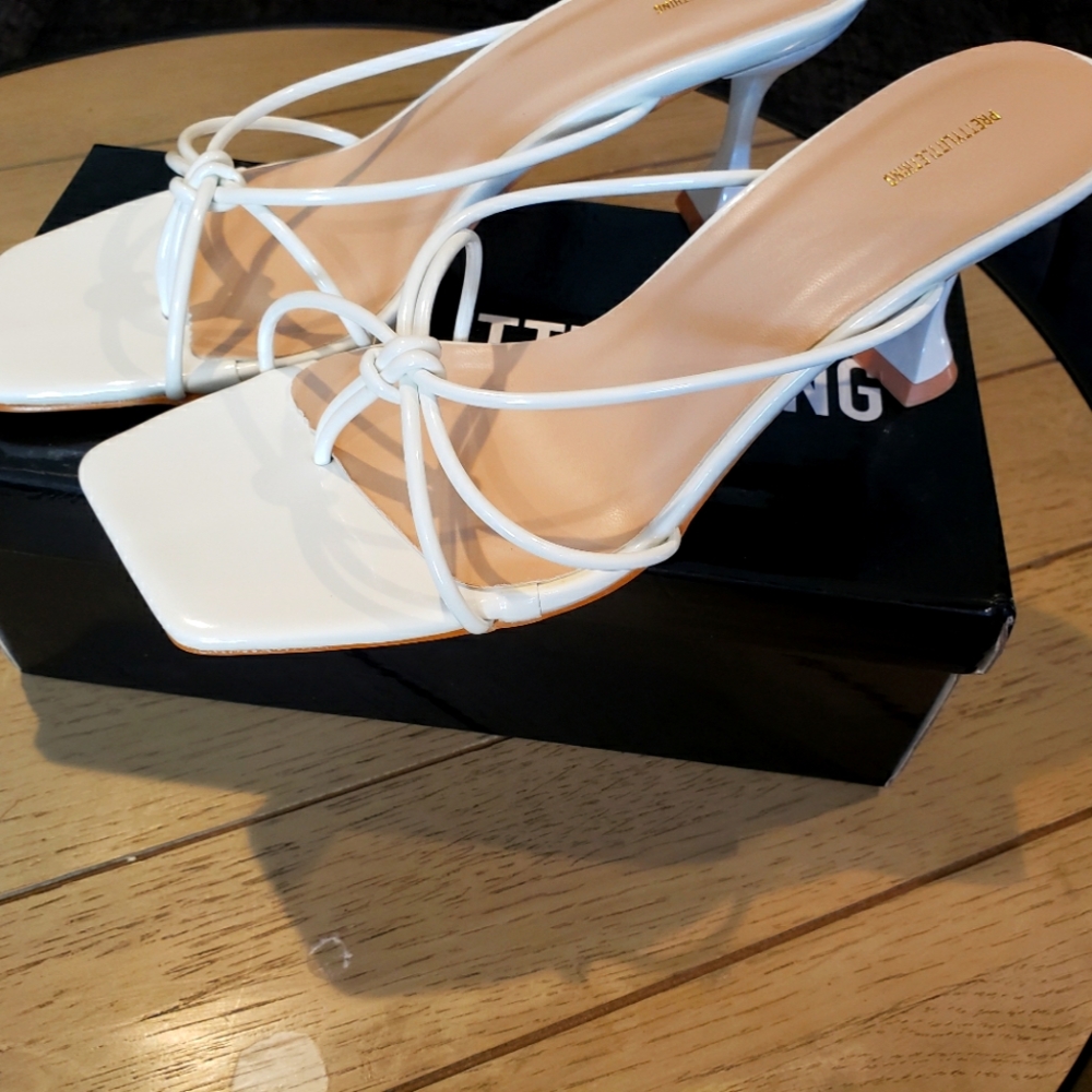 Brand new white heel shoes